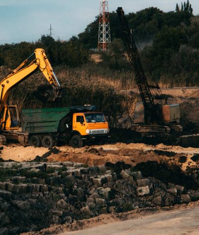 closeup-shot-ongoing-construction-with-tracks-bulldozer-abandoned-land